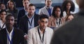 Business people, conference and audience listening to speaker at a seminar, workshop or training. Diversity men and Royalty Free Stock Photo