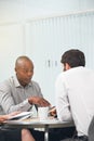 Business people, conference room and meeting with paperwork for teamwork planning, problem solving or collaboration Royalty Free Stock Photo