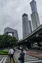 Business people crossing road in COVID19 pandemic, in Guomao Central Business District