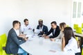 Business people discussing the charts and graphs showing the results of their successful teamwork, multi ethnic business. Business Royalty Free Stock Photo