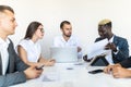 Business people discussing the charts and graphs showing the results of their successful teamwork, multi ethnic business. Business Royalty Free Stock Photo