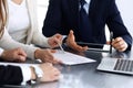 Business people discussing contract working together at meeting at the glass desk in modern office. Unknown businessman Royalty Free Stock Photo