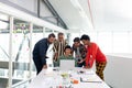 Business people discussing over laptop in the conference room Royalty Free Stock Photo