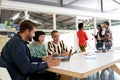 Business people discussing over laptop and sticky notes in the conference room Royalty Free Stock Photo