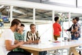 Business people discussing over laptop and sticky notes in the conference room Royalty Free Stock Photo