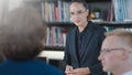 Business people discussing together in conference room during meeting at office Royalty Free Stock Photo