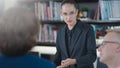 Business people discussing together in conference room during meeting at office Royalty Free Stock Photo