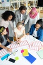 Business people discussing together over documents at conference room in a modern office Royalty Free Stock Photo