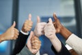 Business people, diversity and hands with thumbs up for agreement, unity or well done at office. Closeup of diverse Royalty Free Stock Photo