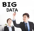 Business people drawing big data text Royalty Free Stock Photo