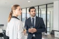 Business people drinking champagne to celebrate success.