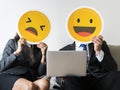 Business people with emoji icons