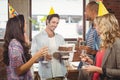 Business people enjoying at birthday party Royalty Free Stock Photo