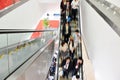 Business people on the escalator Royalty Free Stock Photo
