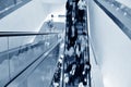 Business people on the escalator Royalty Free Stock Photo