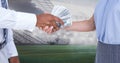 Business people exchanging money at stadium Royalty Free Stock Photo