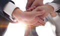 Business people folding their hands together. Royalty Free Stock Photo