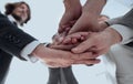 Business people folding their hands together. Royalty Free Stock Photo