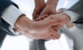 business people folding their hands together. Royalty Free Stock Photo