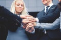 Business people folding their hands together.concept of teamwork Royalty Free Stock Photo