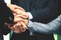 Business people folding their hands together.concept of teamwork Royalty Free Stock Photo