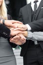 Business people folding their hands together.concept of teamwork Royalty Free Stock Photo