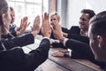 Business people give high five Royalty Free Stock Photo