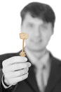 Business people gives us a golden key Royalty Free Stock Photo