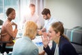 Business people gossiping during meeting