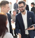 business people greet each other in the office. Royalty Free Stock Photo