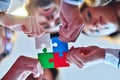 Business people group assembling jigsaw puzzle and represent team support Royalty Free Stock Photo