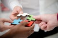 Business people group assembling jigsaw puzzle and represent team support Royalty Free Stock Photo