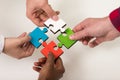 Business people group assembling jigsaw puzzle and represent team support Royalty Free Stock Photo