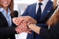 Business people group joining hands and representing concept of friendship and teamwork Royalty Free Stock Photo