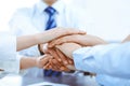 Business people group joining hands and representing concept of friendship and teamwork Royalty Free Stock Photo