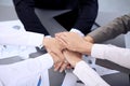 Business people group joining hands and representing concept of friendship and teamwork. Meeting of success team Royalty Free Stock Photo