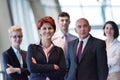 Business people group, woman in front as team leader