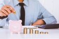 Business people, Handles coins placed on a pile of money saving on the table. Business finance concept Royalty Free Stock Photo