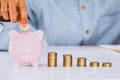 Business people, Handles coins placed on a pile of money saving on the table. Business finance concept Royalty Free Stock Photo