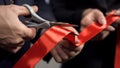 Business people hands cutting red ribbon close-up, new project, opening ceremony Royalty Free Stock Photo