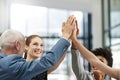 Business people, hands and high five in meeting for teamwork, trust or collaboration together at office. Happy group Royalty Free Stock Photo