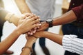 Business people hands stacked showing unity, teamwork and collaboration gesture for a project goal at a team meeting Royalty Free Stock Photo