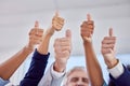 Business people, hands and thumbs up in agreement for success, good job or collaboration at office. Hand of group Royalty Free Stock Photo