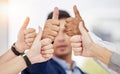 Business people, hands and thumbs up in teamwork agreement for good job, winning or success at the office. Hand of group Royalty Free Stock Photo