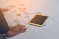 Business people hands working with a tablet on white table background. Copy space. Vintage tone Royalty Free Stock Photo