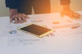 Business people hands working with a tablet on white table background. Copy space. Vintage tone Royalty Free Stock Photo