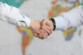 Business people handshake on background of world map of world Royalty Free Stock Photo