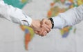 Business people handshake on background of world map of world Royalty Free Stock Photo