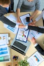 Business people handshake, sitting at the table