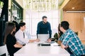 Business people having board meeting in modern office. Teamwork